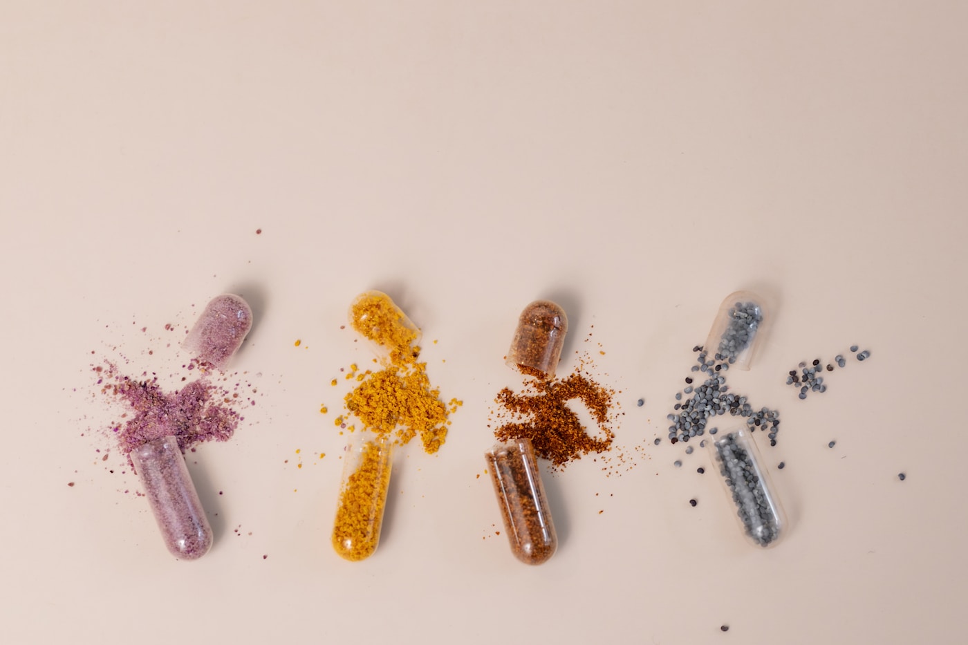 White supplement capsules on a clean surface representing NMN nicotinamide mononucleotide